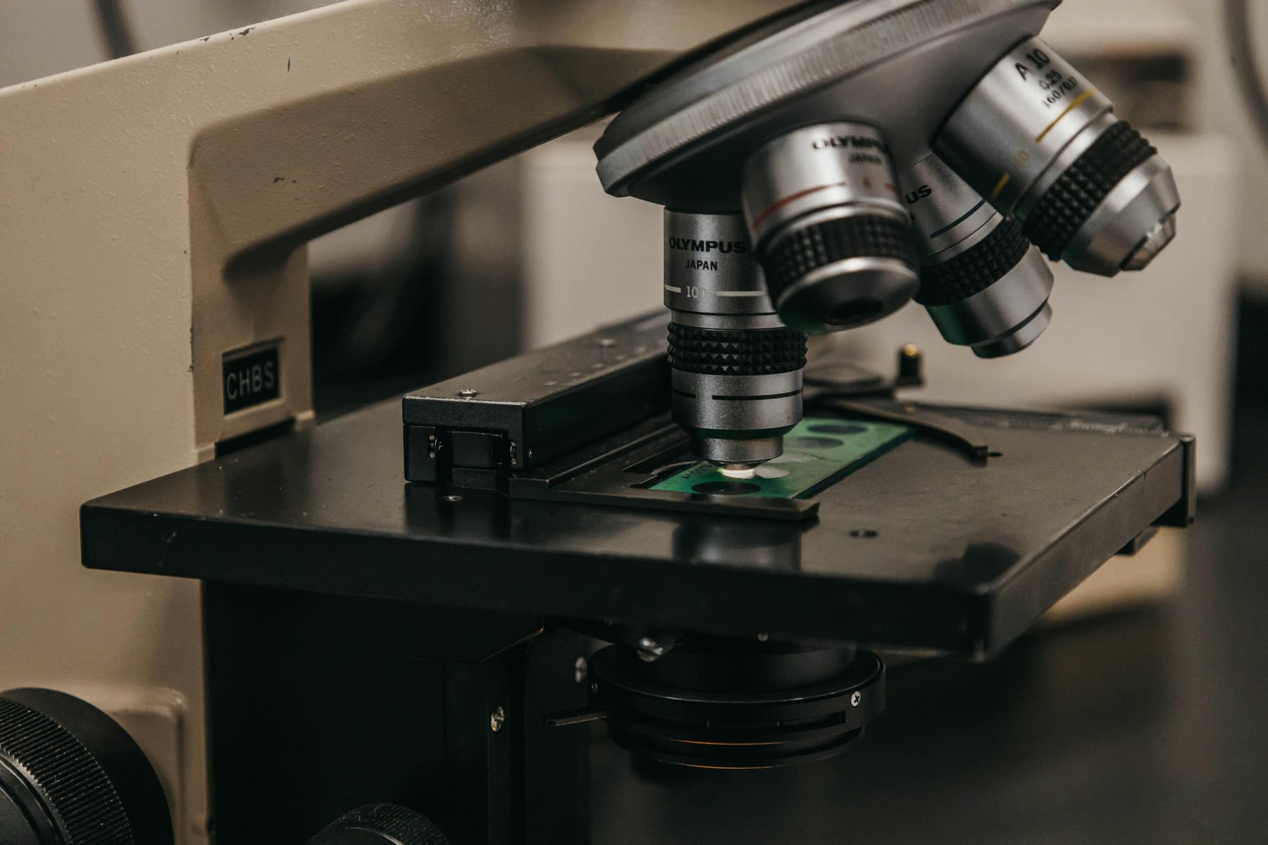 Olympus microscope used for precision materials analysis in a research laboratory